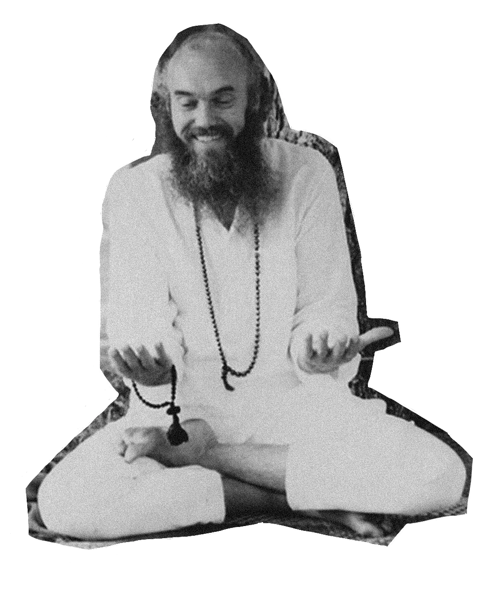 Ram Dass meditating before Buddha statue